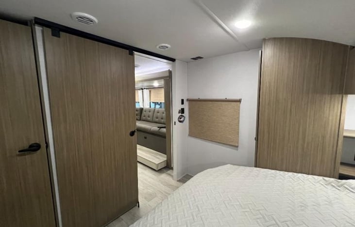 Spacious master with Versa Tilt king bed.