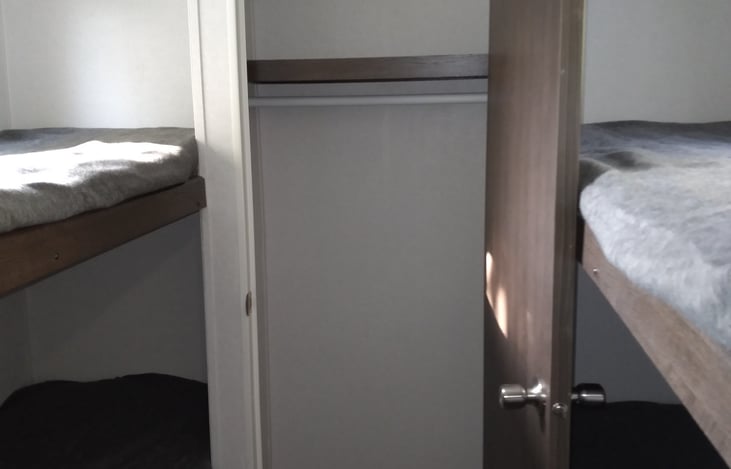 Full closet in the bunkhouse.