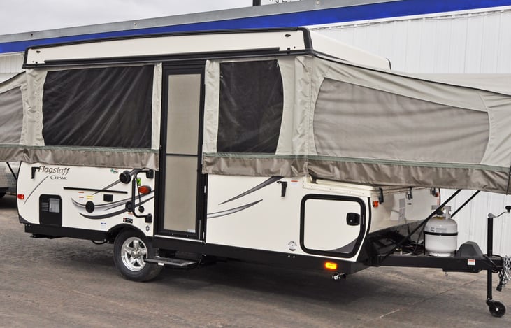 Stock Picture:  Opens up with 3 bump outs for more interior space.  Storage is available.  Spare tire is on the back.  Fan, Stove, Heater, small fridge on board.  Exterior shower.