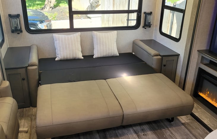 Queen size sleeper sofa. Sleeps 2 adults or kids.