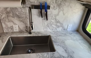 Fun AND Games in a comfy towable land yacht!