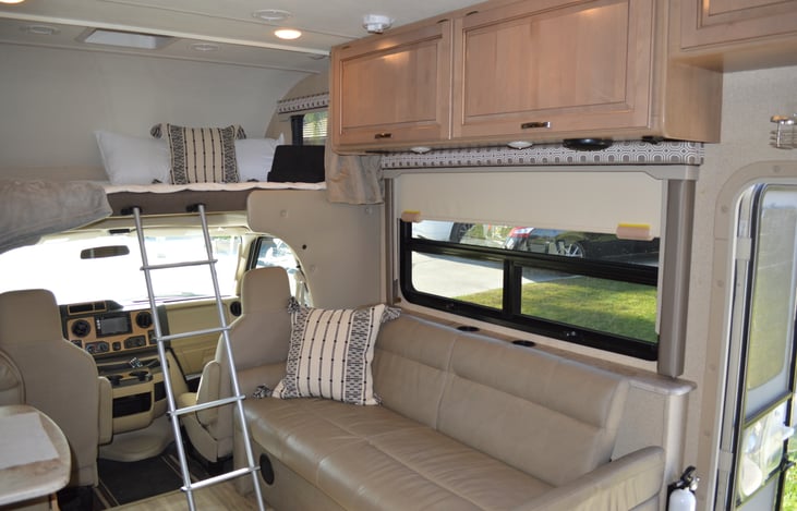 Couch turns into bed, along with the bunk above the cab.