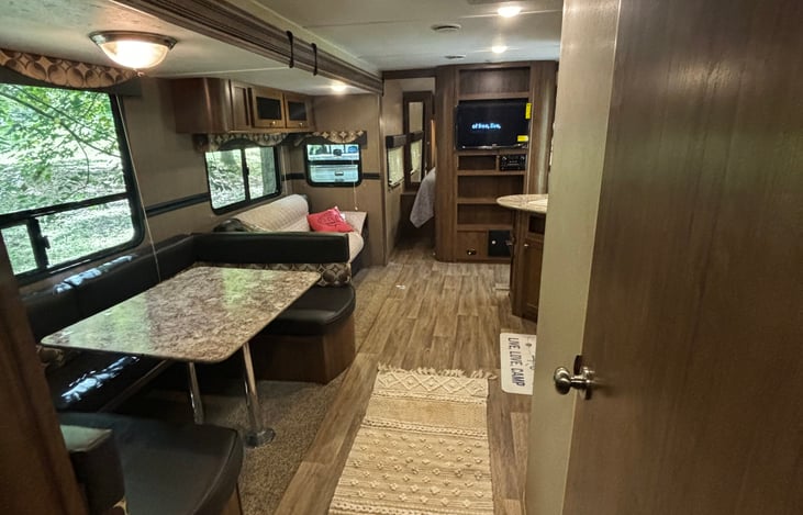 Bunk room to front of camper. Tv pictured is a smart tv you can connect to