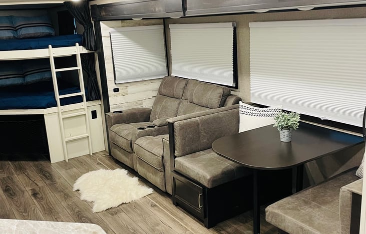 2 massaging recliners to relax in after a long day out exploring