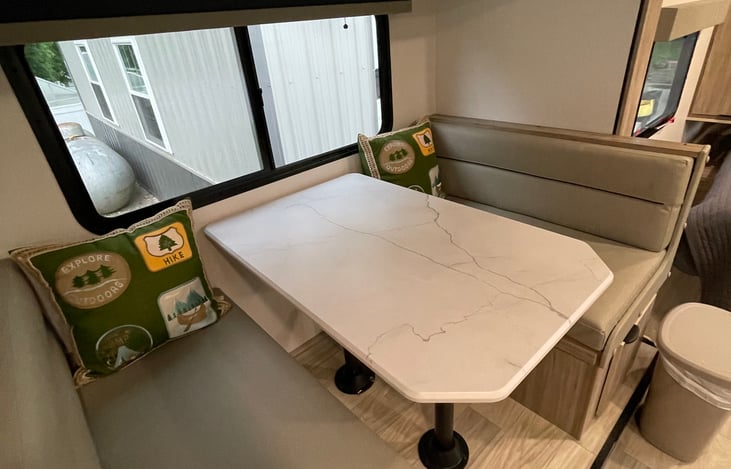Dinette easily converts to a bed. Great for kids, or furry friends.