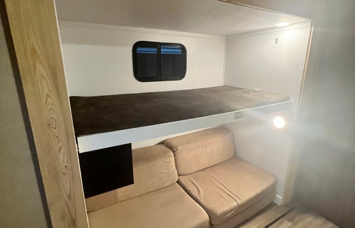 Second bedroom. Top Bunk #1. Bottom lays out to a full size bed.