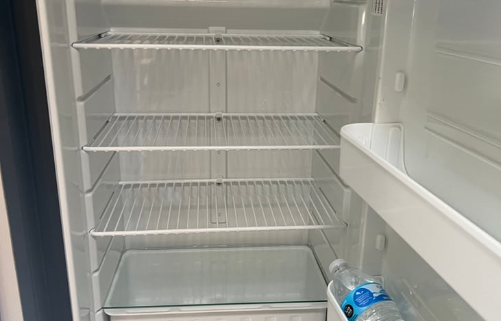 Fridge is medium size. Ice maker is available upon request.