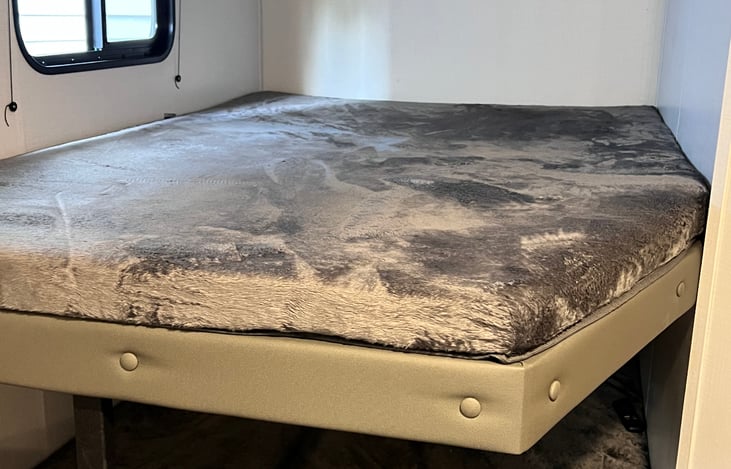 Dual full size bunks in the back.  Plenty of sleeping space!