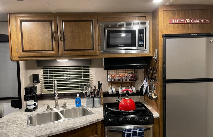 Tea kettle, keurig coffee pods, coffee mugs provided