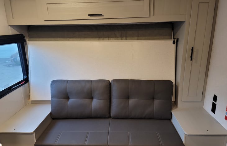 Couch with Murphy Bed tucked away behind