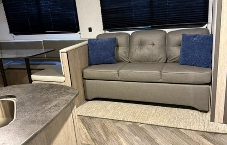 Couch. Also folds down to a small sleeping space