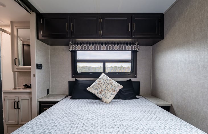 Large master bedroom with comfortable mattress and plenty of storage!