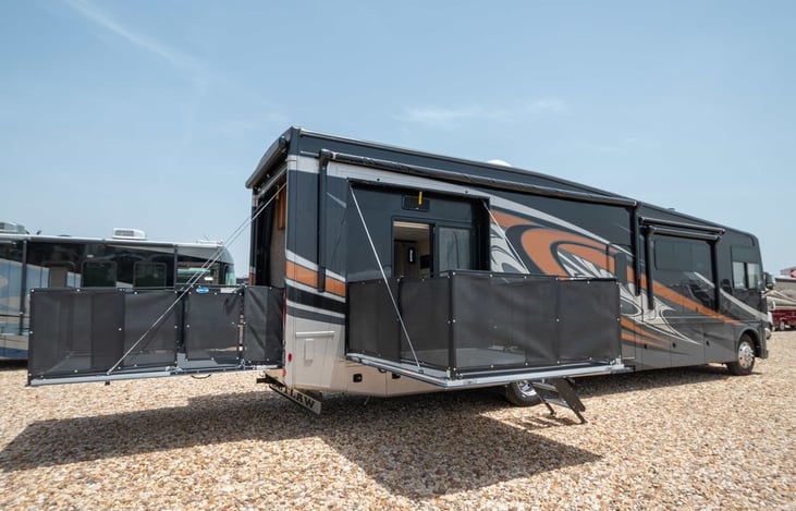 This isn't our actual RV, but it's the same exact model and shows what it looks like with the patios down. New photos will be updated soon!