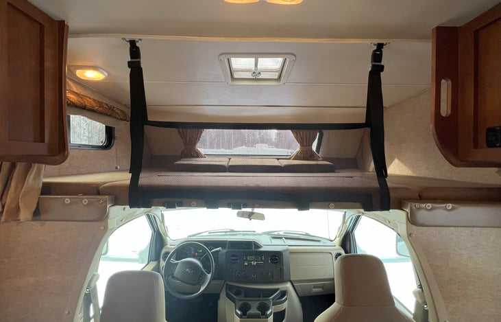 Upper bunk safety net for active sleepers.  Bunk dimensions = 57" x 95"; for comparison, probably closest to queen size, which is 60" x 80".