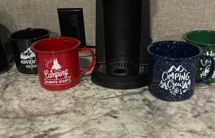 We have provided a toaster, keurig coffee maker, coffee cups, and a counter top ice maker for your camping pleasure! There is a set of food storage bowls in a variety of sizes!