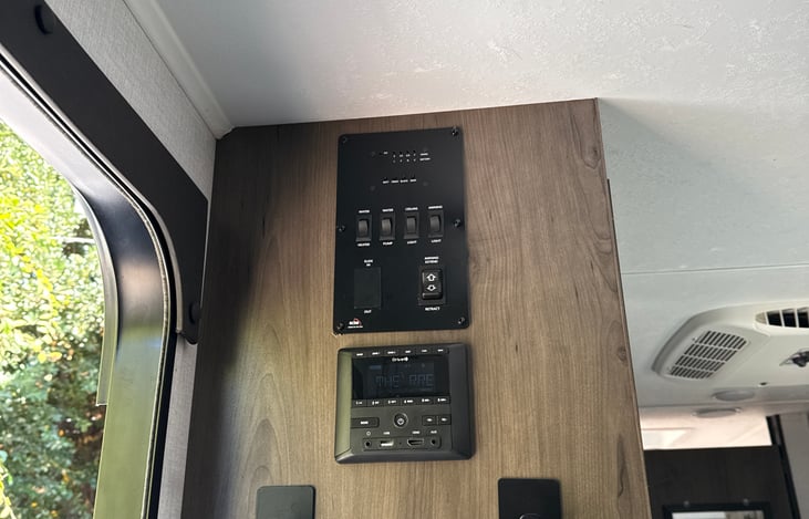 Control panel. Bluetooth music to inside or outside of trailer.