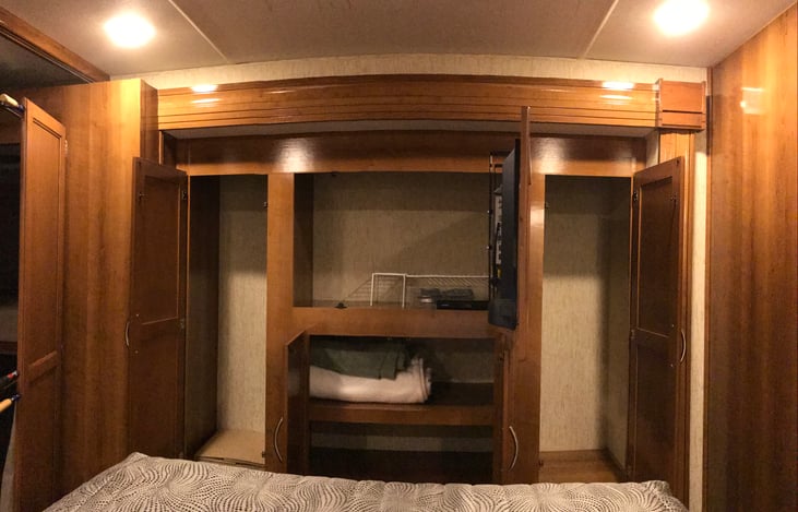 Bedroom closets and drawers below