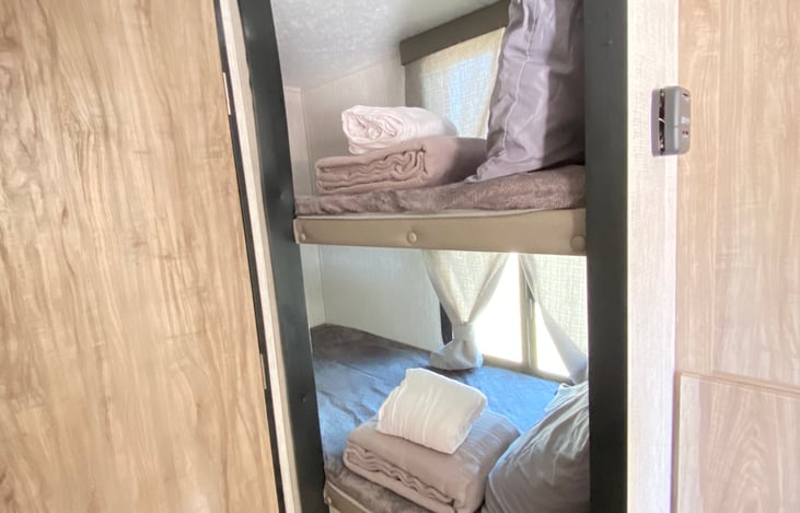 Bunk beds includes complete bedding.