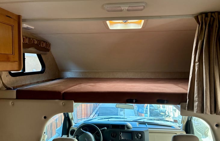 additional bed on top of driver and passenger