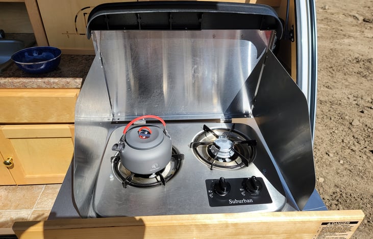 This camper comes with a propane stove, propane not included, but drinking tea at night can always end a long day of hiking.