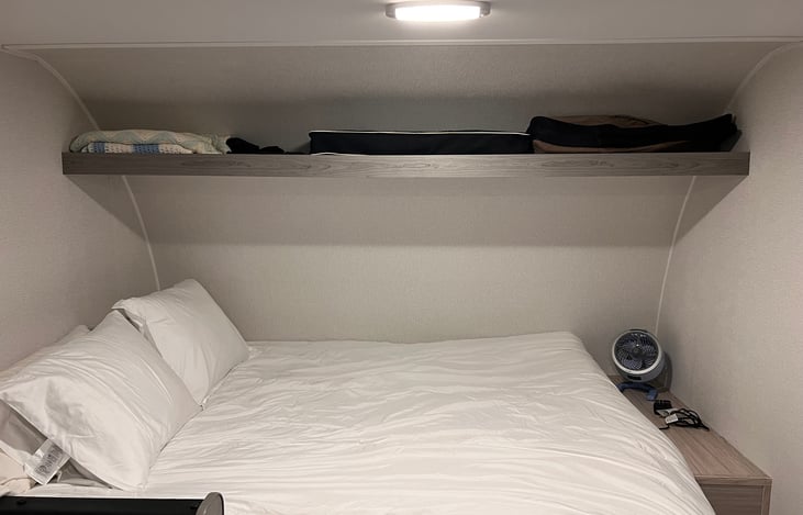 There’s plenty of storage above the bed