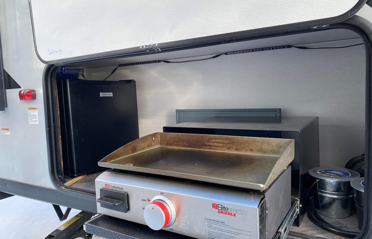 Outside griddle and mini frig