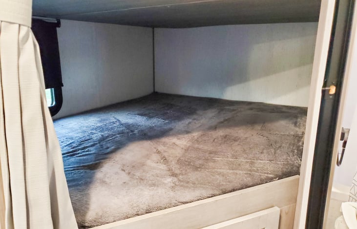 Bottom bunk with LED light and USB charging port