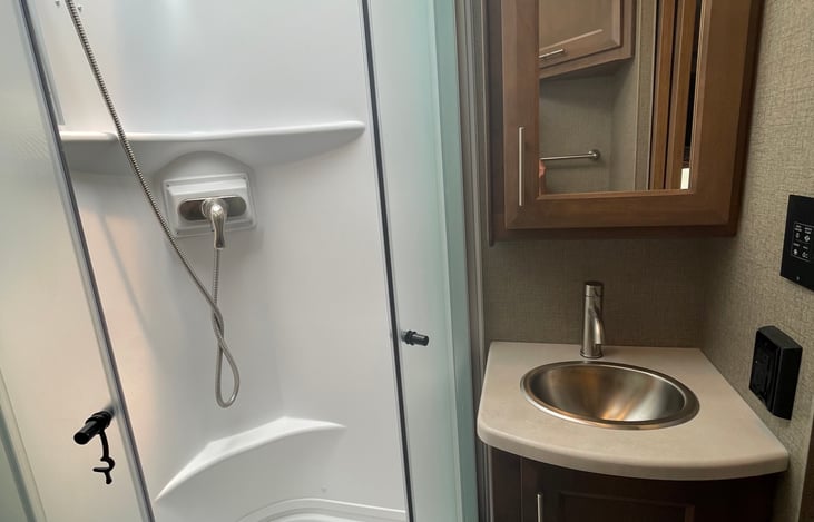 Full size shower and vanity