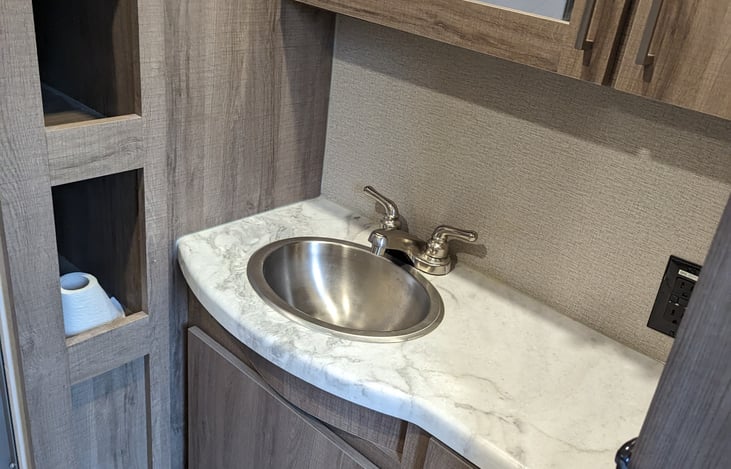 Sink and bathroom counter.