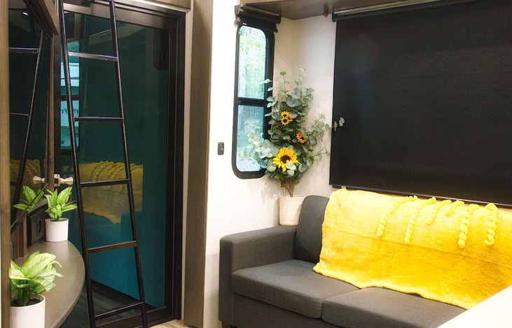 The couch can double for another place to sleep.  What's behind that door? Well how about another bedroom with two beds and a half bath OR the on ramp for your 4 wheelers OR another louge area.