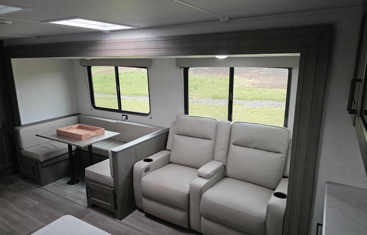 Living Space - U-shaped Dinette and Dual Power Recliners