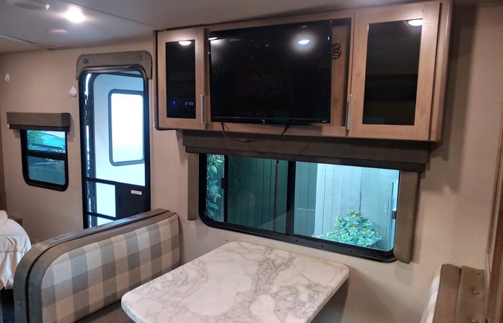 entertainment center table turns into bed