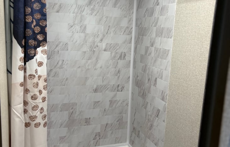 Front bathroom With the shower area.