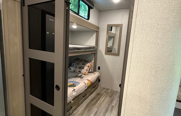 Private bunkhouse with two beds. Great for remote working as an office or home schooling.