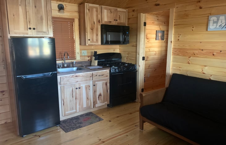 Full kitchen and pull-out futon sofa.