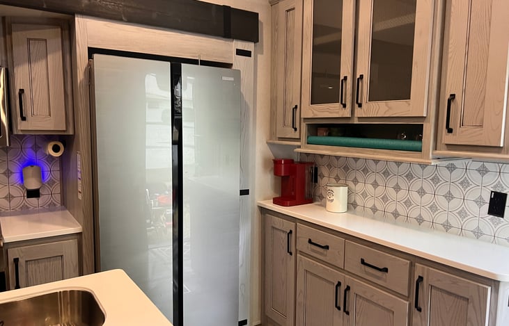 Full sized refrigerator and coffee bar