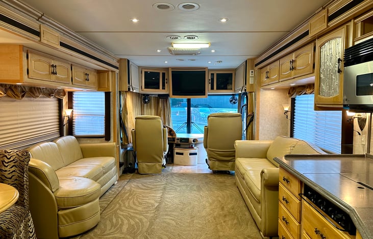 Approximately 12’ wide with the slides out