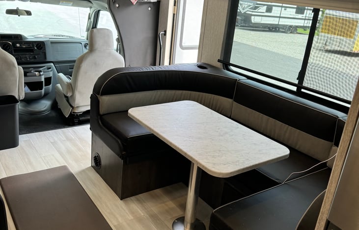 Large table that seats 5 or more! Area makes into very comfortable bed