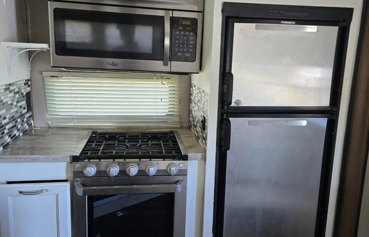 Refrigerator, stove, oven, microwave, trashcan cabinet