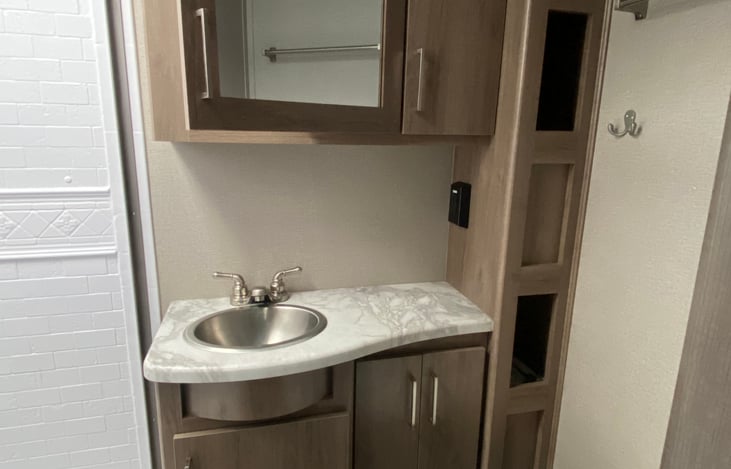 full bathroom with lots of storage