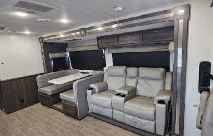 Both chairs recline, heat and vibrate.