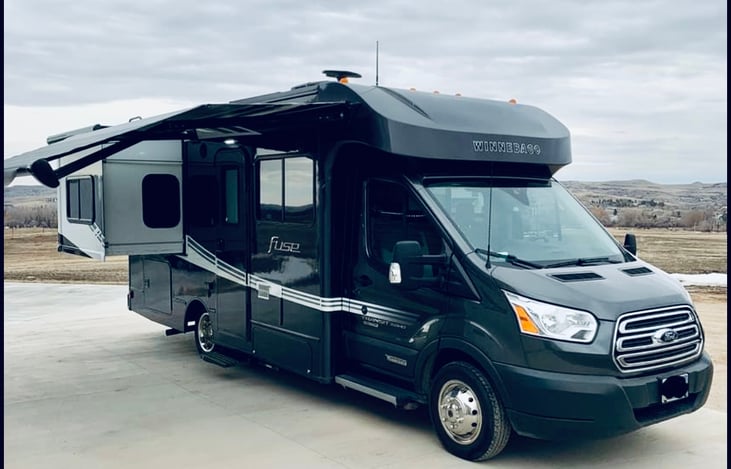 Slide-out and awning with LED lighting, and high wind technology.