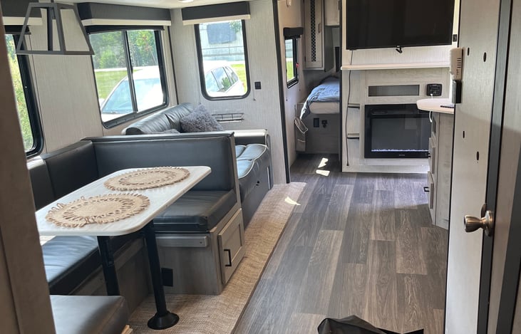 Living room area 
Dinette
Couch 
Fireplace 
Tv