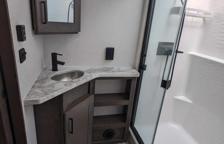 Full bath.  Easily accommodates people as tall as 6'4" or more.