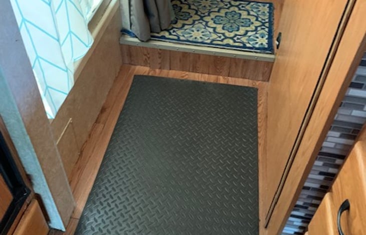 Floor between shower and bathroom door