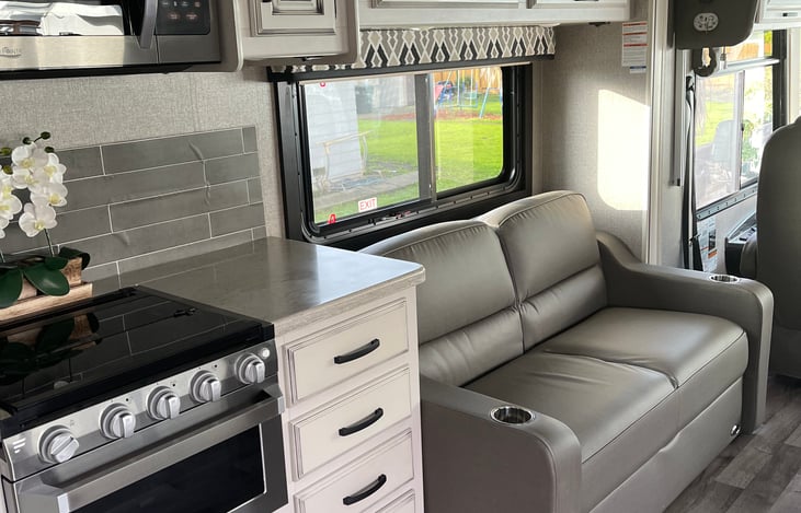 RV - tri-fold sofa with inflatable queen size mattress