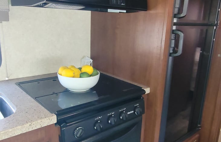 Three burner range and oven.