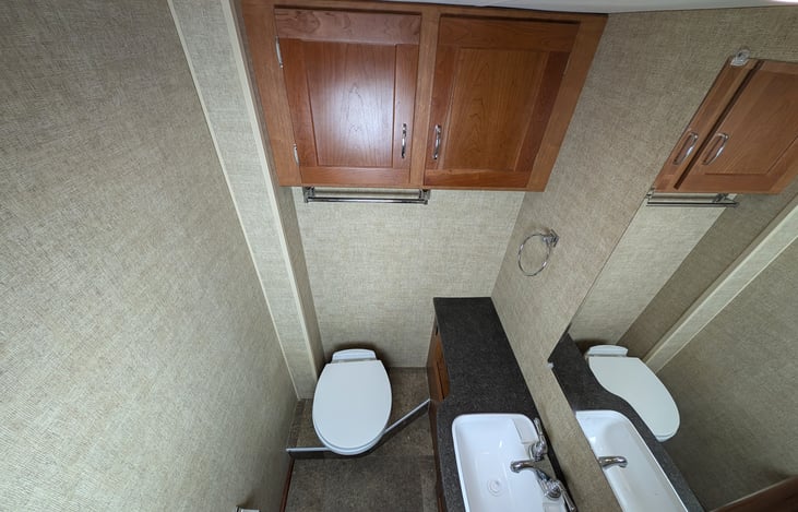 Split bathroom with a separate shower and toilet maximizes comfort.