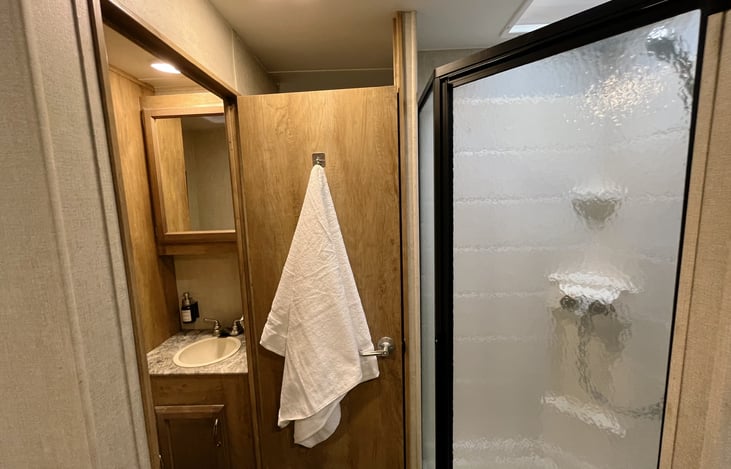 Door to bathroom duals to close off the back area for more privacy and ease for getting ready for your day of adventure