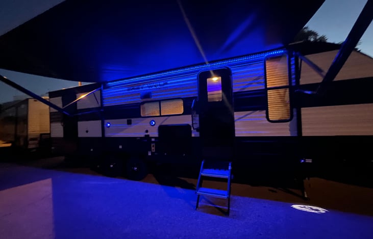 Exterior accent lights on, with awning